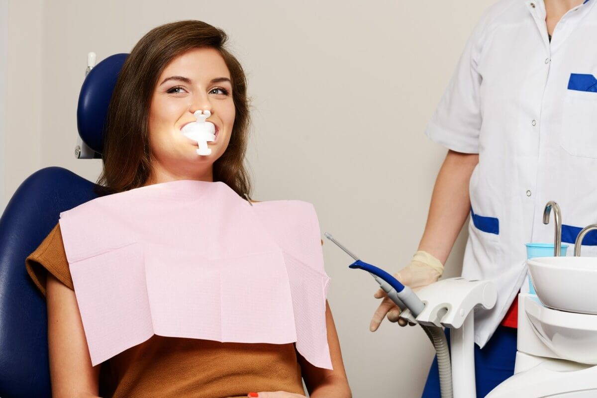 the pros and cons of laser whitening and teeth bleaching